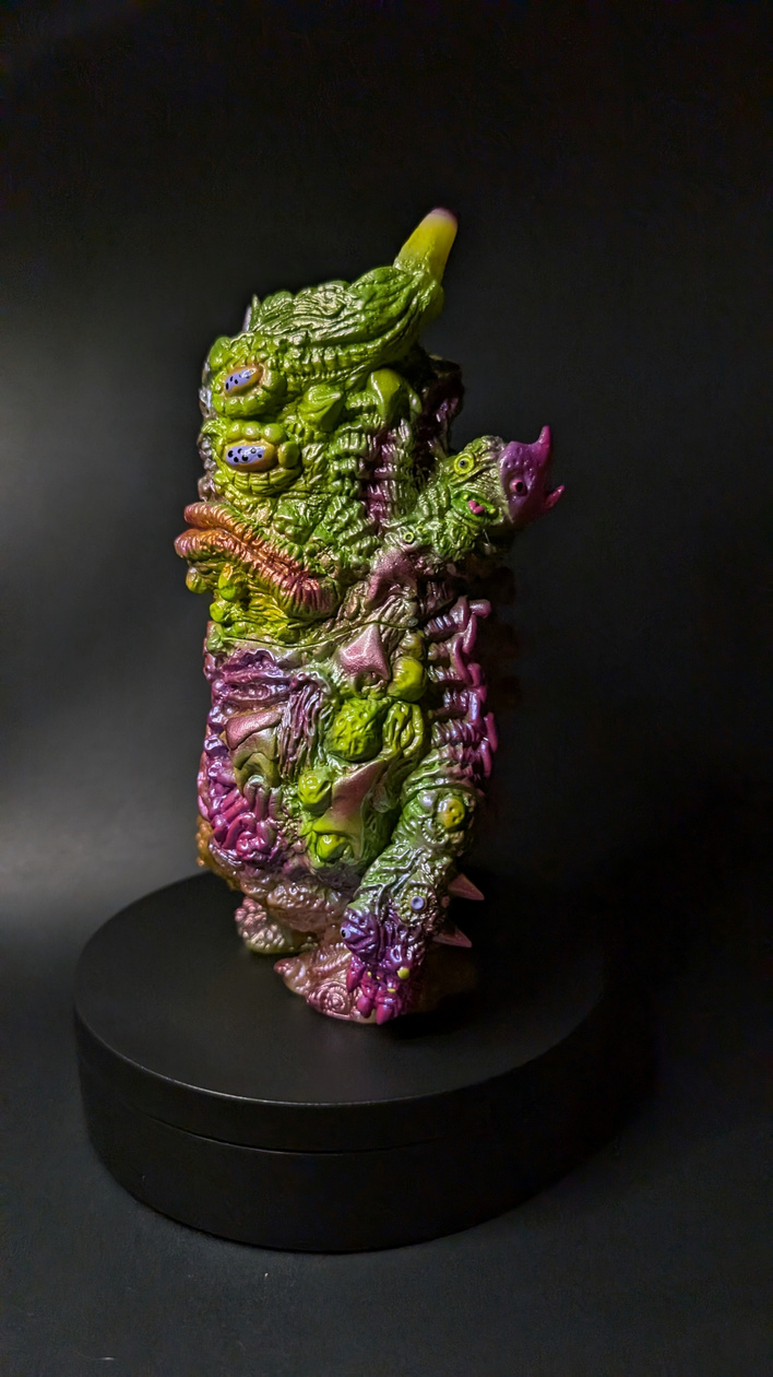POND SCUM GORRMON ($250) Paints, pearls and interwoven colourshifts on soft vinyl by STATION CITY
